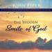 The Hidden Smile of God